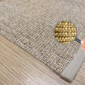 the corner of the rug, with a gray border and gray-beige mat color