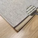 beige synthetic sisal rug of waterproof synthetic  fibers with beige brown sewed border