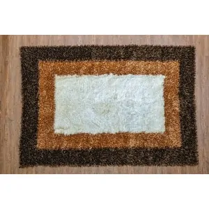 Color: geometric rug with a rectangular parallelogram, ice white with a camel brown border and a second dark brown border