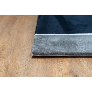 MODERN BOHO CARPET OFFER  black with gray and white lines throughout that form asymmetrical flowers