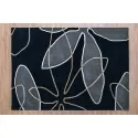 HANDMADE ACRYLIC RUG FLORAL PATTERN black with gray and white lines throughout that form asymmetrical flowers