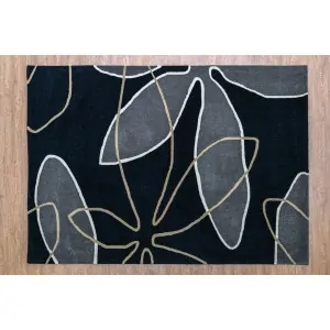 HANDMADE ACRYLIC RUG FLORAL PATTERN black with gray and white lines throughout that form asymmetrical flowers