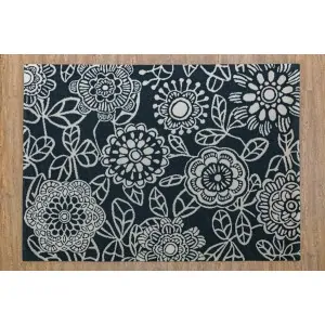 black carpet with large oriental white flowers