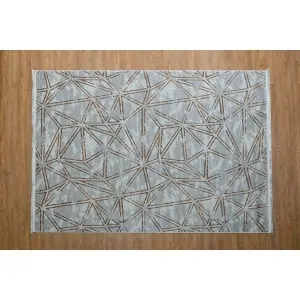 discount carpet color: gray silver with joined brown bronze triangle shapes