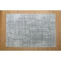 discount rug Color: cream gray with a small mosaic pattern