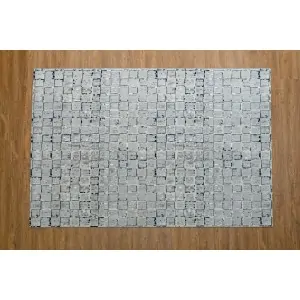 discount rug Color: gray with blue small mosaic pattern
