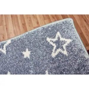 the blue corner of the carpets for kids with white stars on sale in Greece lefko