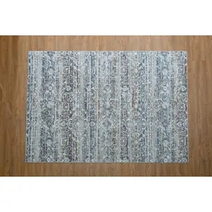 Color: gray beige white with ethnic distinctive pattern with blue and brown accents