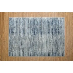 Color: gray white with beige and blue asymmetrical stripes