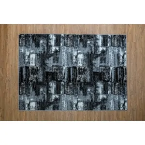 discount carpet color  dark gray printed with subtractive pattern in tones of gray, white, beige, charcoal, black