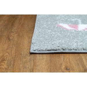 the corner of the grey kids carpet with pink umbrella and dimensions 160X230