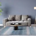 gray living room with brown gray, light blue carpet with herringbone mosaic by Colore Colori with quality guarantee