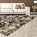 living room with white sofa and Thema vintage rug