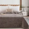 bed made with the brown taupe blanket from the company liolios home