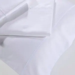 White sheet set with pillowcases down town cotton satin from the linen store in Greece Lefko