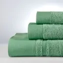 green cotton towels set down town home greece