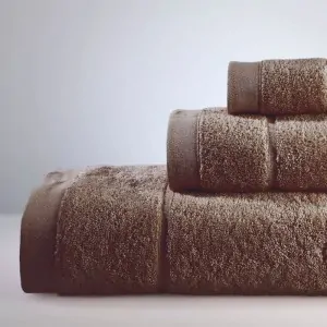 dark brown cotton towels set down town home greece