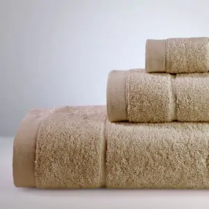 light brown cotton towels set down town home greece