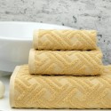 dusty yellow milano towels set by greek brand Liolios Home in a bathroom in Peloponnese