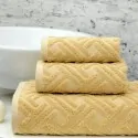 dusty yellow milano towels set by greek brand Liolios Home in a bathroom in Peloponnese