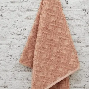 hanged dusty blush cotton towels by Liolios Home in Leyko Korinthia