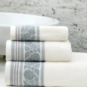 white towels Liolios Home with grey roses in a greek bathroom