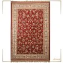 classic red carpet with beige frame and pattern of flowers