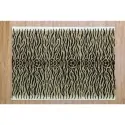 Color: Modern ethnic rug with an Indian aesthetic dominated by the tiger animal print in black and white.