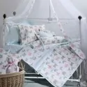 Baby crib quilt white, sky blue and pink with butterfly pattern. Down Town in White