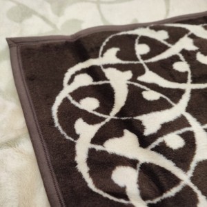 blanket of beige color with tribal brown pattern in Korinthia