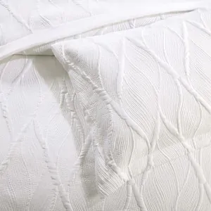 bedspread and white pillowcase by liolios home in greece
