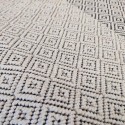 summer rug with wicker weave, white and black with small diamonds, for boho decoration