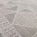 summer rug with wicker weave in ecru, beige, with geometric patterns of rhombuses, lines, squares