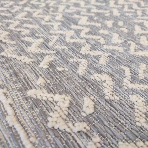 Summer synthetic runner rug with wicker weave in shades of ecru, gray, with vintage abstract waves