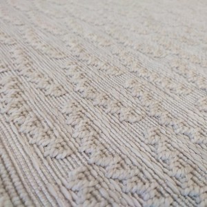 summer rug with ecru wickerwork, with abstract patterns that look like clouds