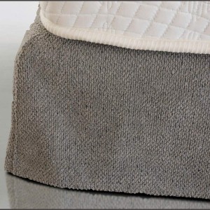 bed with grey fabric around its leds for modern bedrooms, at korinthos, peloponnese