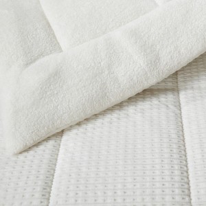 off white quilt with a unique feeling of softness to enjoy from  Liolios Home