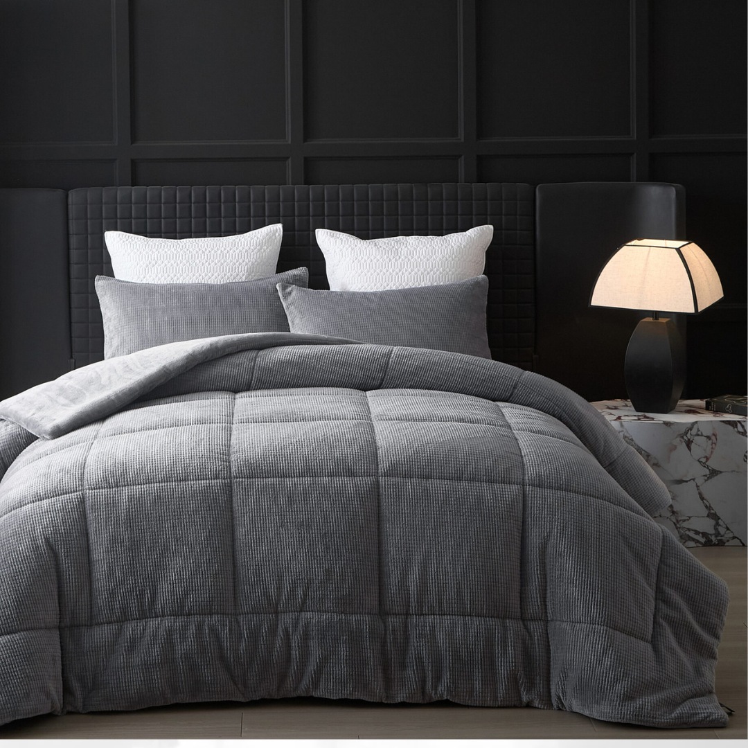 Bedroom with black wall and dark charcoal duvet