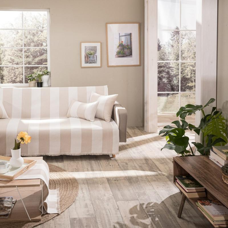 beige striped throw in a summer living room